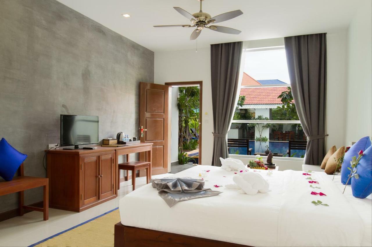 Cozy Boutique Hotel Ciudad de Siem Riep Exterior foto